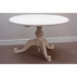 Circular painted pine dining table on carved tripod pedestal base, D122cm,