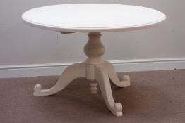 Circular painted pine dining table on carved tripod pedestal base, D122cm,