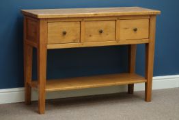 Light oak three drawer console table, W109cm, H78cm,