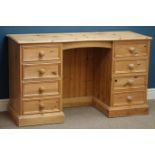 Solid pine twin pedestal dressing table, eight drawers, W132cm, H77cm,