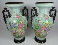 Pair of late 19th Century continental urn shaped vases with hand painted decoration,