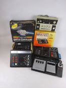 Collection of vintage game consoles including Binatone, Ingersoll, Grandstand,