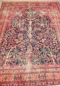 Persian tree of life design red and blue ground rug carpet, interlacing floral pattern,
