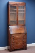 Early 20th century oak fall front bureau bookcase, two lead glazed doors, three drawers, W77cm,