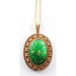 Continental green enamel and gold pendant necklace indistinct marks and 9ct import hallmarks