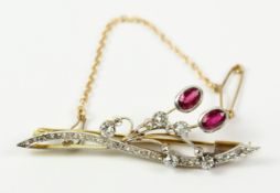 Ruby and diamond platinum set floral spray gold brooch tested to 18ct Condition Report