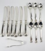 Set of six Edwardian silver coffee spoons with shell terminals and matching sugar nips Sheffield
