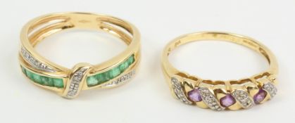 Diamond and emerald gold cross-over ring and an amethyst and diamond scroll gold ring both