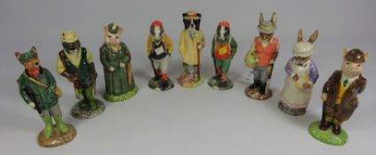 Set of nine Beswick English Country Folk including Mrs Rabbit Baking, Gardener Rabbit, The Lady Pig,