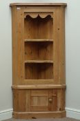 Polished pine corner shelf with cupboard, W74cm,