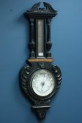 Victorian aneroid barometer in ebonised carved oak case,