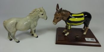 Beswick donkey with football on wooden plinth no.