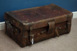 Early 20th century leather travelling trunk with brass studded top and NER label,