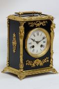 Early 20th century French gilt metal ebonised mantel clock,