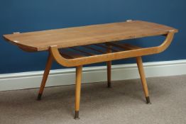 Danish teak coffee table, reversible top, raised on tapering legs, 118cm x 43cm,