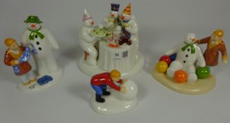 Four Coalport Snowman figures - limited edition 'The Merry Trio', 'Building The Snowman',