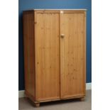 Waxed pine two door cupboard, W86cm, H144cm,
