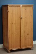 Waxed pine two door cupboard, W86cm, H144cm,