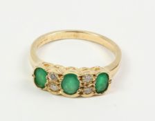 Emerald and diamond gold ring hallmarked 9ct Condition Report <a href='//www.