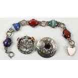 Two Scottish silver brooches set with cornelian and amethyst and a similar hardstone bracelet all