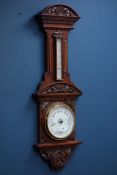 Victorian carved oak aneroid barometer with thermometer,