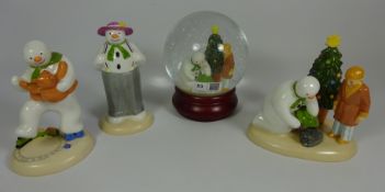 Coalport Snowman glitter globe and three Coalport Snowman figures - limited edition 'Christmas