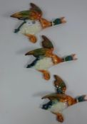 A graduated set of three Beswick flying Mallard ducks Condition Report <a