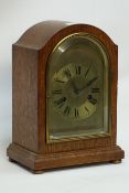 Early 20th century oak cased dome top mantel clock, eight day striking movement,