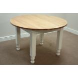 Circular light oak dining table on turned painted base, D120cm,