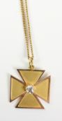 Diamond set Maltese cross pendant stamped 15c approx. 4 gm on chain necklace stamped 9ct approx.