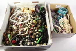 Vintage and later bead and other necklaces and jewellery in two boxes Condition Report