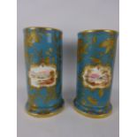 Pair of small Victorian cylindrical vases painted with landscapes on blue & gilt ground, painted no.