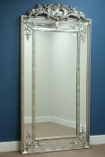 Large rectangularm French style wall mirror in silvered frame with carved pediment,