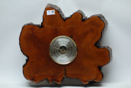 Daymaster Aneroid barometer in rustic wooden surround,