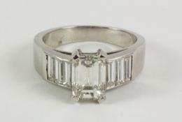 Emerald cut diamond white gold ring with baguette diamond shoulders centre diamond approx 1.