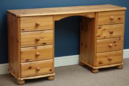 Twin pedestal eight drawer dressing table/desk, W134cm, H75cm,