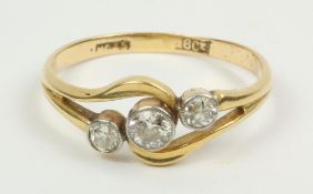 Three stone diamond rim set ring stamped 18ct Condition Report <a href='//www.