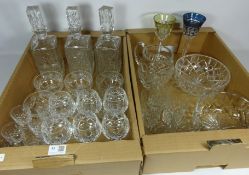 Pair of crystal decanters and a similar decanter, set of six wine glasses,