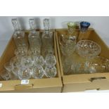 Pair of crystal decanters and a similar decanter, set of six wine glasses,