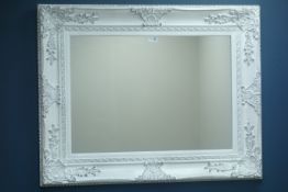 Rectangular wall mirror in white swept frame,