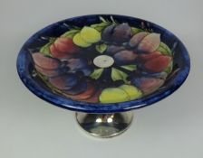 Moorcroft Wisteria and Plum pattern tazza with silver plated stand,