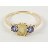 Opal and tanzanite three stone ring hallmarked 9ct Condition Report <a
