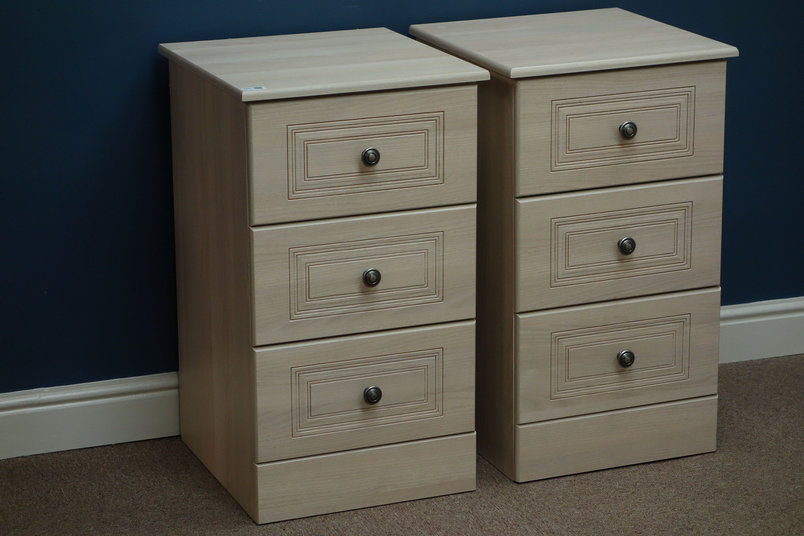 Pair wood finish three drawer bedside chests, W43cm, H74cm,