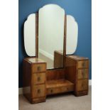 Early 20th century drop centre dressing table, seven drawers, triple mirror back, W115cm, H140cm,