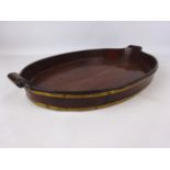 19th century Gillows style brass bound mahogany oval tray with scroll carved handles,