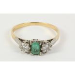 Three stone emerald and diamond ring tested to 18ct Condition Report <a