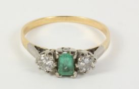 Three stone emerald and diamond ring tested to 18ct Condition Report <a