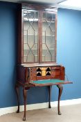 Early 19th century mahogany and mahogany banded secretaire bookcase,