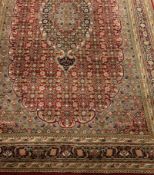 Persian Bidjar maroon ground with pale blue rug carpet, repeating Heratti motif field,