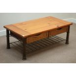 Polished pine rectangular coffee table with sliding baskets and undertier below, 122cm x 67cm,